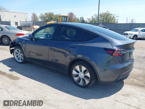2022 Tesla Model Y Long Range with VIN 7SAYGDEE3NA007737, listed as a IAAI auction lot 42128359 with 42,597 mi miles and . Bid and sale history available at carsss.com. Image 3.