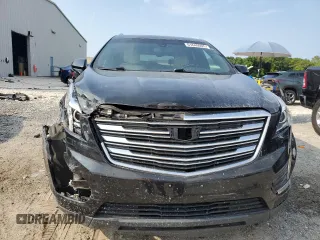 2017 Cadillac XT5 FWD with VIN 1GYKNARS0HZ283618, listed as a Copart auction lot 61640005 with 113,823 mi miles and Salvage title. Bid and sale history available at DreamBid. Image 5.