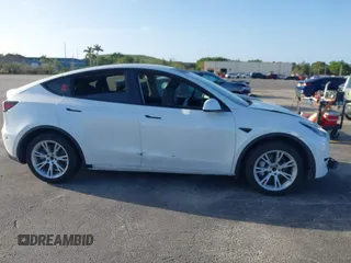 2021 Tesla Model Y Standard Range with VIN 5YJYGDED3MF103650, listed as a IAAI auction lot 41726278 with Not Provided miles and . Bid and sale history available at DreamBid. Image 12.