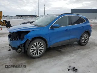 2020 Ford Escape Titanium z VIN 1FMCU9J92LUA16437, wystawiony jako Copart lot #43363525 z przebiegiem 58 030 mil mil oraz Szkody całkowita. Historia ofert i sprzedaży dostępna na DreamBid. Obrazek 1.