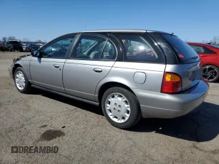 1997 Saturn SW z VIN 1G8ZK8274VZ194085, wystawiony jako Copart lot #50230135 z przebiegiem 211 051 mil mil oraz Szkody całkowita. Historia ofert i sprzedaży dostępna na DreamBid. Obrazek 2.