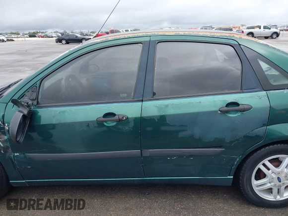 2000 Ford Focus LX with VIN 1FAFP33P8YW336316, listed as a IAAI auction lot 41904496 with 215,100 mi miles and . Bid and sale history available at carsss.com. Image 15.
