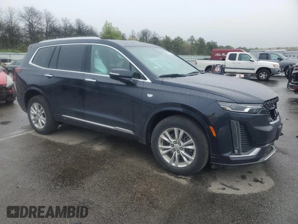 2021 Cadillac XT6 AWD Luxury with VIN 1GYKPBR4XMZ215970, listed as a Copart auction lot 56762225 with 47,800 mi miles and Salvage title. Bid and sale history available at DreamBid. Image 4.