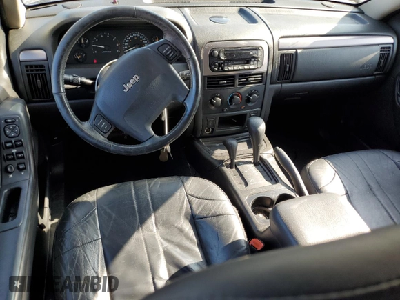 2004 Jeep Grand Cherokee Laredo z VIN 1J4GW48S14C350441, wystawiony jako Copart lot #59434415 z przebiegiem 78 449 mil mil oraz Czysty tytuł • Clean title. Historia ofert i sprzedaży dostępna na DreamBid. Obrazek 8.