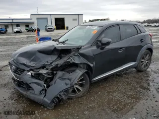 2017 Mazda CX-3 Grand Touring with VIN JM1DKFD76H0155511, listed as a Copart auction lot 48402965 with 107,027 mi miles and Salvage Title. Bid and sale history available at carsss.com. Image 1.