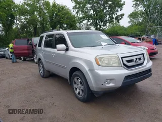 2009 Honda Pilot Touring z VIN 5FNYF48929B053308, wystawiony jako IAAI lot #42319950 z przebiegiem 345 970 mil mil oraz . Historia ofert i sprzedaży dostępna na DreamBid. Obrazek 1.
