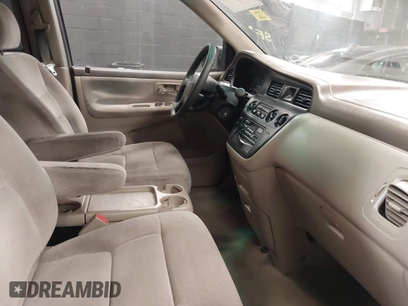 2004 Honda Odyssey LX with VIN 5FNRL18534B072936, listed as a IAAI auction lot 42366971 with 185,534 mi miles and . Bid and sale history available at DreamBid. Image 5.