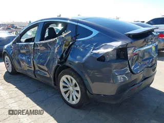 2018 Tesla Model X 75D with VIN 5YJXCBE26JF121937, listed as a IAAI auction lot 41652666 with 93,478 mi miles and . Bid and sale history available at carsss.com. Image 3.