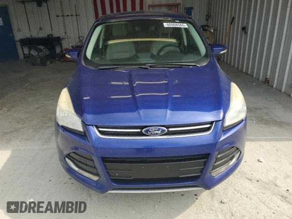 2013 Ford Escape SEL с VIN 1FMCU9HXXDUD63553, выставлен на аукционе Copart как лот 60908565 с пробегом 150 132 миль миль и Списание • Salvage title. История ставок и продаж доступна на DreamBid. Изображение 5.