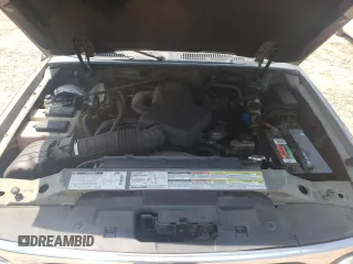 1999 Ford Explorer XLT z VIN 1FMZU32E4XUB76005, wystawiony jako Copart lot #65391564 z przebiegiem 245 873 mil mil oraz Szkoda całkowita • Salvage title. Historia ofert i sprzedaży dostępna na DreamBid. Obrazek 12.