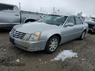 2010 Cadillac DTS 1SA z VIN 1G6KA5EY8AU125083, wystawiony jako Copart lot #49010915 z przebiegiem 122 006 mil mil oraz Czysty tytuł • Clean title. Historia ofert i sprzedaży dostępna na DreamBid. Obrazek 1.
