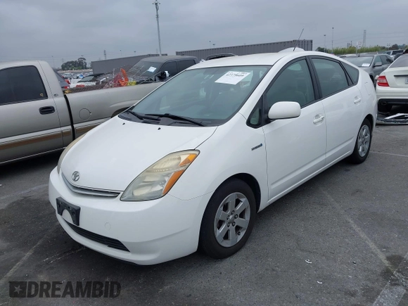 2007 Toyota Prius z VIN JTDKB20UX77550163, wystawiony jako IAAI lot #42379609 z przebiegiem 136 507 mil mil oraz . Historia ofert i sprzedaży dostępna na DreamBid. Obrazek 2.