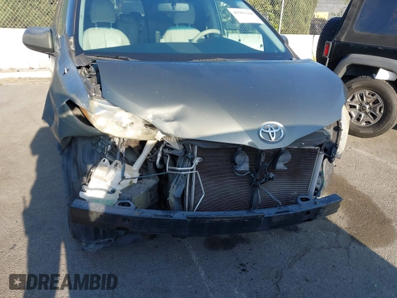 2013 Toyota Sienna LE AAS with VIN 5TDKK3DC0DS313786, listed as a IAAI auction lot 41981268 with 162,423 mi miles. Bid and sale history available at carsss.com. Image 6.