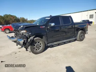 2020 Chevrolet Silverado 1500 LT with VIN 1GCUYDEDXLZ253923, listed as a Copart auction lot 82211904 with 95,574 mi miles and Salvage Title. Bid and sale history available at DreamBid. Image 1.