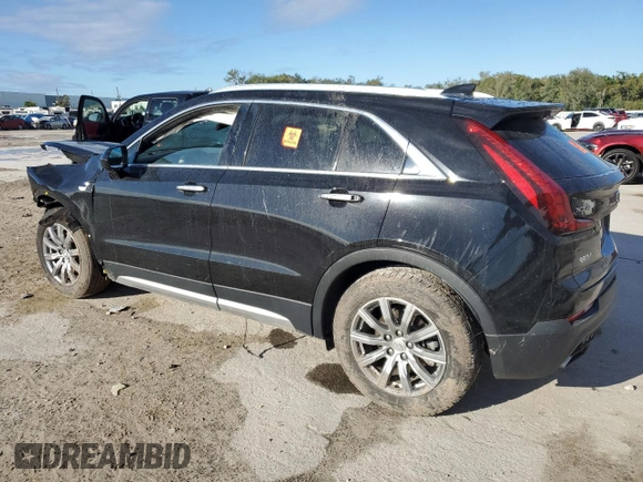 2020 Cadillac XT4 FWD Premium Luxury z VIN 1GYFZCR4XLF070463, wystawiony jako Copart lot #86223304 z przebiegiem Nie podano mil oraz Nie do naprawy • Non repairable. Historia ofert i sprzedaży dostępna na DreamBid. Obrazek 2.
