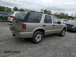 2004 Chevrolet Blazer LS z VIN 1GNDT13X84K162807, wystawiony jako Copart lot #57154205 z przebiegiem 82 732 mil mil oraz Czysty tytuł • Clean title. Historia ofert i sprzedaży dostępna na DreamBid. Obrazek 3.