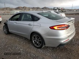2019 Ford Fusion Hybrid Titanium with VIN 3FA6P0RU9KR153657, listed as a Copart auction lot 36272673 with 52,852 mi miles. Bid and sale history available at carsss.com. Image 2.