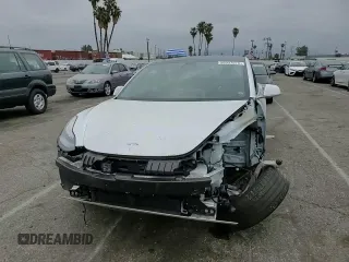 2020 Tesla Model 3 Standard Range Plus with VIN 5YJ3E1EA5LF747010, listed as a Copart auction lot 50937975 with Not Provided miles and Salvage Title. Bid and sale history available at DreamBid. Image 11.