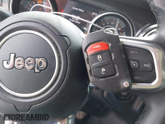 2021 Jeep Wrangler Unlimited Sahara z VIN 1C4HJXEN6MW764662, wystawiony jako IAAI lot #42494617 z przebiegiem 81 954 mil mil oraz . Historia ofert i sprzedaży dostępna na DreamBid. Obrazek 11.