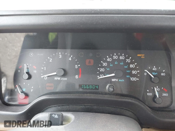 1999 Jeep Wrangler SE z VIN 1J4FY29P5XP487111, wystawiony jako IAAI lot #42125867 z przebiegiem 156 804 mil mil oraz . Historia ofert i sprzedaży dostępna na DreamBid. Obrazek 7.