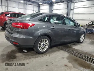 2017 Ford Focus SE with VIN 1FADP3F21HL205754, listed as a Copart auction lot 63632985 with 96,797 mi miles and Salvage title. Bid and sale history available at DreamBid. Image 3.