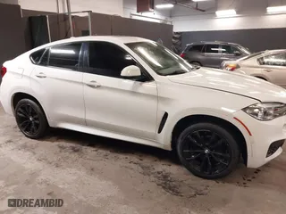 2019 BMW X6 sDrive35i with VIN 5UXKU0C5XK0S97686, listed as a IAAI auction lot 40436492 with 105,584 mi miles. Bid and sale history available at carsss.com. Image 13.