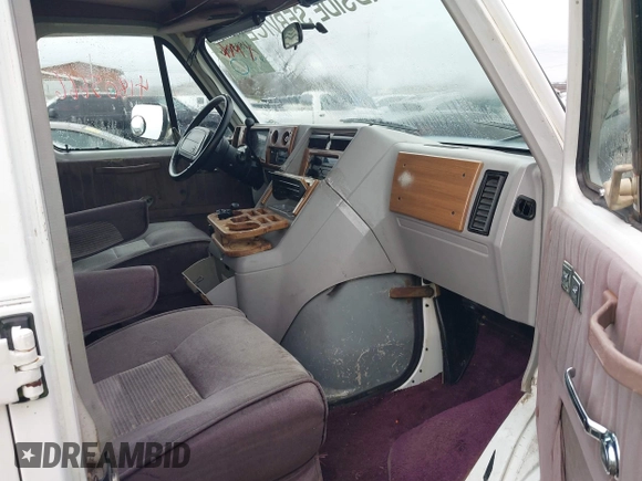 1994 Chevrolet Chevy Van z VIN 1GBEG25K7RF187968, wystawiony jako IAAI lot #41805666 z przebiegiem 224 279 mil mil oraz . Historia ofert i sprzedaży dostępna na DreamBid. Obrazek 5.