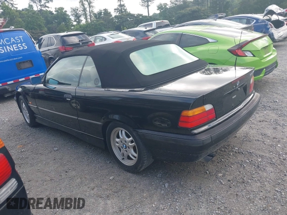 1999 BMW 3 Series 323i with VIN WBABJ8330XEM23911, listed as a IAAI auction lot 42523948 with 125,371 mi miles and . Bid and sale history available at DreamBid. Image 3.
