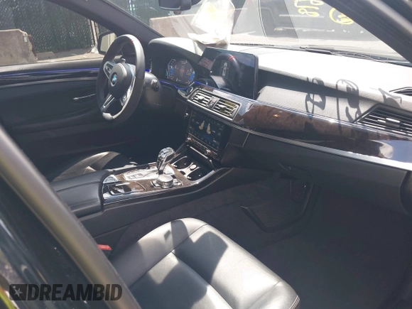 2015 BMW 5 Series 535i xDrive with VIN WBA5B3C51FD544384, listed as a IAAI auction lot 42810878 with 67,014 mi miles and . Bid and sale history available at DreamBid. Image 5.