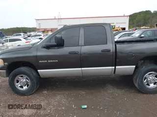 2005 Dodge 2500 SLT with VIN 1D7KS28D35J511215, listed as a IAAI auction lot 41326185 with 302,586 mi miles and . Bid and sale history available at DreamBid. Image 14.