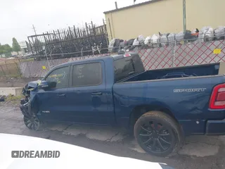 2023 Ram 1500 Laramie with VIN 1C6SRFJT9PN542437, listed as a IAAI auction lot 42256410 with 5 mi miles and . Bid and sale history available at DreamBid. Image 14.
