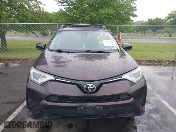 2018 Toyota RAV4 LE with VIN 2T3BFREV9JW857284, listed as a IAAI auction lot 42448480 with 85,551 mi miles and . Bid and sale history available at DreamBid. Image 12.