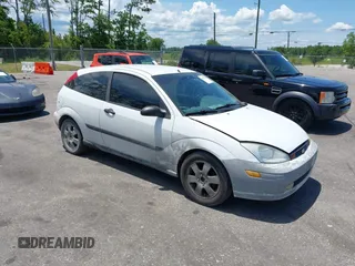 2001 Ford Focus ZX3 with VIN 3FAFP31311R243811, listed as a IAAI auction lot 42599151 with 144,485 mi miles and . Bid and sale history available at DreamBid. Image 1.