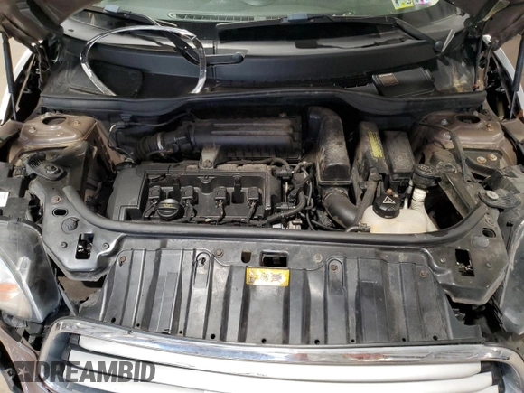 2012 MINI Countryman with VIN WMWZB3C52CWM01672, listed as a Copart auction lot 56064265 with 97,267 mi miles and Salvage Title. Bid and sale history available at DreamBid. Image 11.