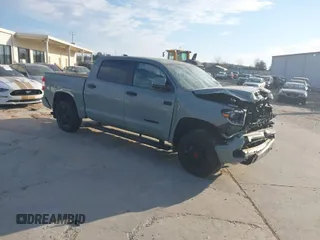 2021 Toyota Tundra SR5 with VIN 5TFDY5F14MX046533, listed as a IAAI auction lot 41663194 with 55,758 mi miles and . Bid and sale history available at DreamBid. Image 1.