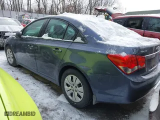 2014 Chevrolet Cruze LS with VIN 1G1PB5SG7E7142059, listed as a IAAI auction lot 41435050 with 106,067 mi miles. Bid and sale history available at carsss.com. Image 3.