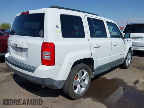 2011 Jeep Patriot Latitude with VIN 1J4NT1GB5BD245263, listed as a IAAI auction lot 41942376 with 215,147 mi miles. Bid and sale history available at carsss.com. Image 4.