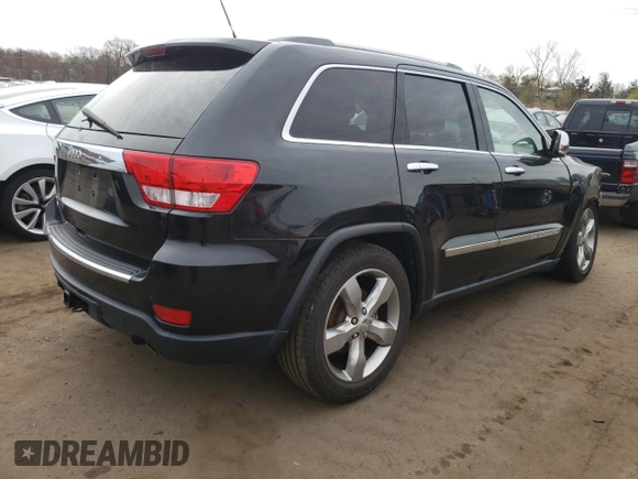 2011 Jeep Grand Cherokee Overland with VIN 1J4RR6GT9BC660730, listed as a Copart auction lot 53770745 with 106,351 mi miles and Salvage title. Bid and sale history available at DreamBid. Image 3.
