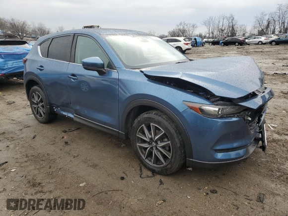 2018 Mazda CX-5 Touring with VIN JM3KFBCM0J0363036, listed as a Copart auction lot 47085755 with 61,928 mi miles and Salvage Title. Bid and sale history available at DreamBid. Image 4.