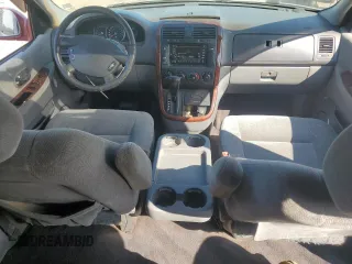2003 Kia Sedona LX with VIN KNDUP131236411909, listed as a Copart auction lot 73715384 with 179,642 mi miles and Salvage Title. Bid and sale history available at carsss.com. Image 8.