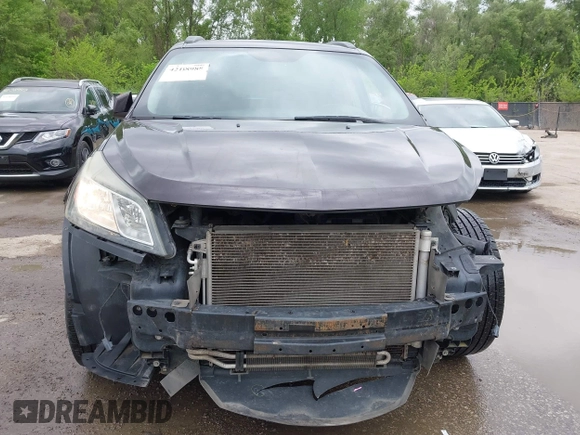 2015 Chevrolet Traverse LT with VIN 1GNKVGKD2FJ201718, listed as a IAAI auction lot 42138988 with 176,586 mi miles and . Bid and sale history available at DreamBid. Image 13.
