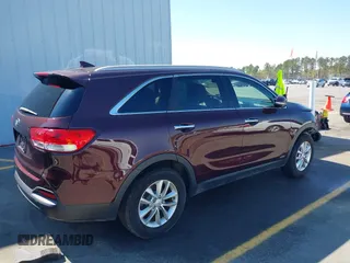 2016 Kia Sorento LX with VIN 5XYPGDA30GG154142, listed as a IAAI auction lot 41899356 with 141,312 mi miles. Bid and sale history available at carsss.com. Image 4.