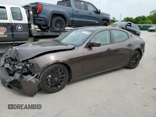 2014 Maserati Ghibli S Q4 with VIN ZAM57RTA6E1085708, listed as a Copart auction lot 53710095 with 110,799 mi miles and Salvage title. Bid and sale history available at DreamBid. Image 1.