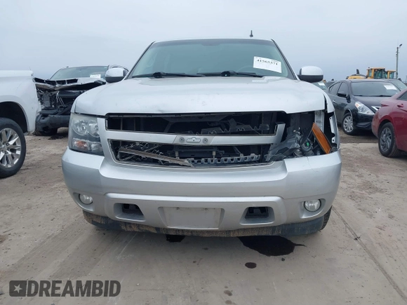 2013 Chevrolet Suburban LTZ with VIN 1GNSCKE02DR369777, listed as a IAAI auction lot 41565371 with 205,768 mi miles and . Bid and sale history available at DreamBid. Image 12.