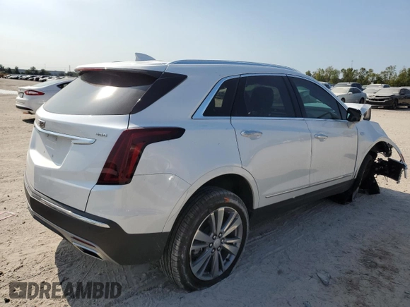 2024 Cadillac XT5 FWD Premium Luxury with VIN 1GYKNCRS1RZ735184, listed as a Copart auction lot 80688374 with 10,587 mi miles and Salvage Title. Bid and sale history available at carsss.com. Image 3.