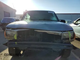 2000 Cadillac Escalade z VIN 1GYEK13R5YR107157, wystawiony jako Copart lot #89024795 z przebiegiem 172 599 mil mil oraz Szkody całkowita. Historia ofert i sprzedaży dostępna na DreamBid. Obrazek 5.