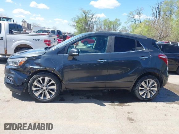 2017 Buick Encore Essence with VIN KL4CJCSB4HB012026, listed as a IAAI auction lot 41974604 with 139,467 mi miles and . Bid and sale history available at carsss.com. Image 14.