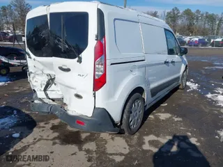 2015 Ford Transit Connect XLT with VIN NM0LS7F7XF1217950, listed as a IAAI auction lot 41269747 with 219,702 mi miles. Bid and sale history available at carsss.com. Image 4.