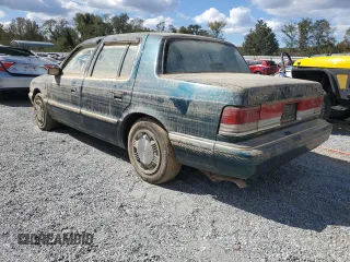 1993 Plymouth Acclaim z VIN 1P3XA4634PF673210, wystawiony jako Copart lot #75919254 z przebiegiem 186 440 mil mil oraz Szkody całkowita. Historia ofert i sprzedaży dostępna na DreamBid. Obrazek 2.