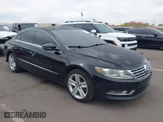 2013 Volkswagen CC Sport with VIN WVWBP7AN6DE504679, listed as a IAAI auction lot 42034362 with 148,527 mi miles. Bid and sale history available at carsss.com. Image 1.